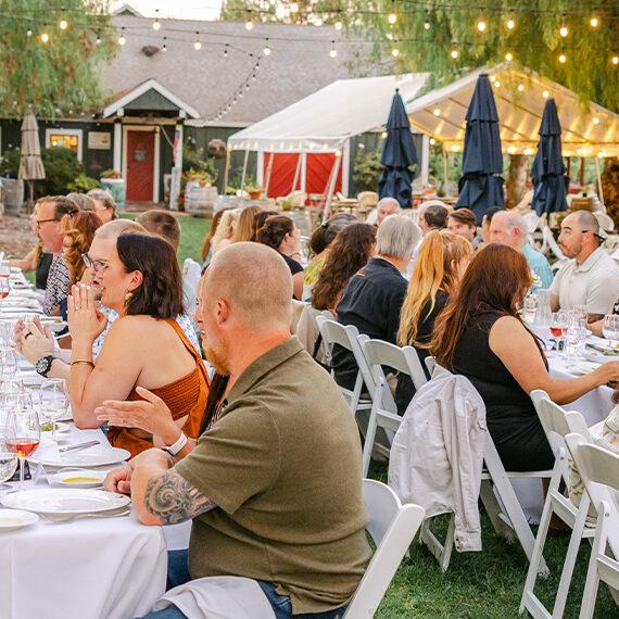 Group of people dining at Retzlaff Vineyards